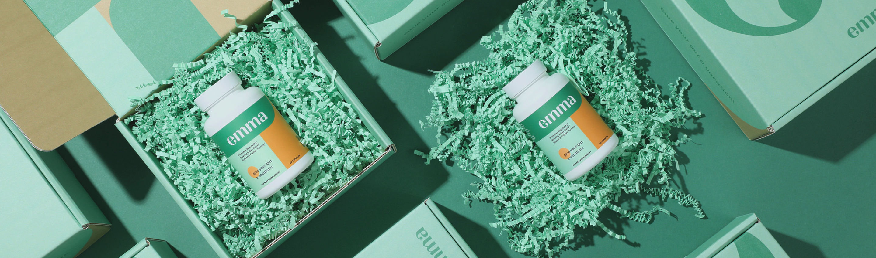 a bottle of medicine on top of shredded paper